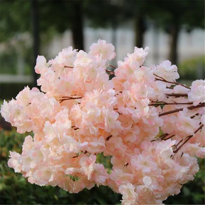 Kirschblüten-Zweig gefälschte Kirschblüte-Blumen-Stamm mehr Blumenköpfe 4 Farben für Hochzeits-Mittelstücke Partei-künstliche dekorative Blumen