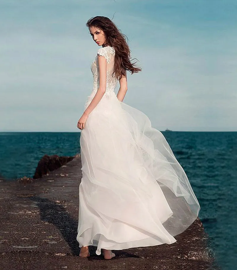 Boho Lace Appliques Bröllopsklänningar Bohemiska Brudklänningar med Cap Sleeves och V Neck Avtagbar Kjol Elegant A-Line Bridal Gowns