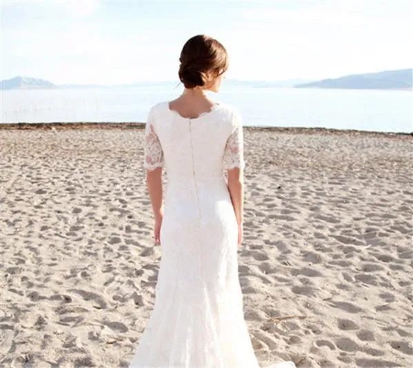 Blygsamma korta ärmar bröllopsklänningar med pärlor för strandträdgård eleganta brudar spets brudklänningar vestidos