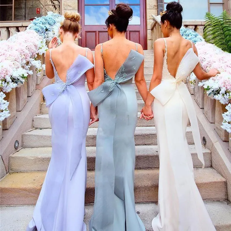 Latest Sexy Mermaid Bridesmaid Dresses Plunging Neckline Appliques Sleeveless Bow Wedding Party Dresses 2017 Fashion Satin Long Prom Dresses