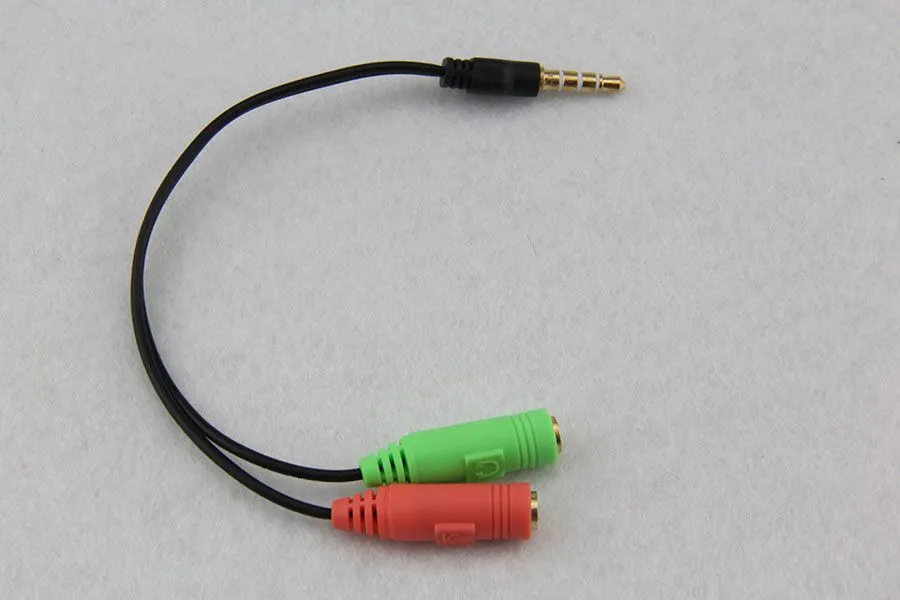 2 tot 1 audiokabel adapter lijn conversie hoofd in twee mobiele telefoon headset computer MP3-speler game box microfoon draai 300pcs / lot