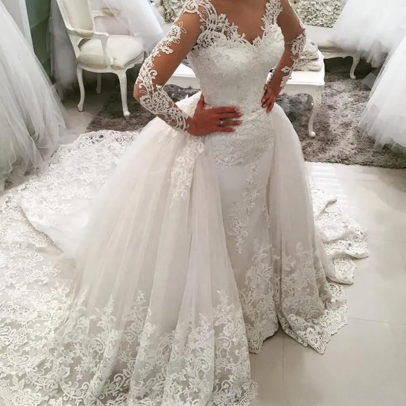 Modest 2017 Lace Aplikacja Overskirt Suknie ślubne z odpinanym pociągiem z długim rękawem Tulle Suknie ślubne Custom Made China EN12169