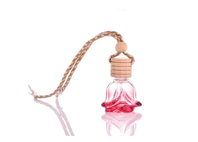 Vente chaude vide Hang Pandent bouteille de parfum, décoration de voiture de parfum en verre créatif, bouteille rechargeable de parfum de voiture en verre de forme de fleur