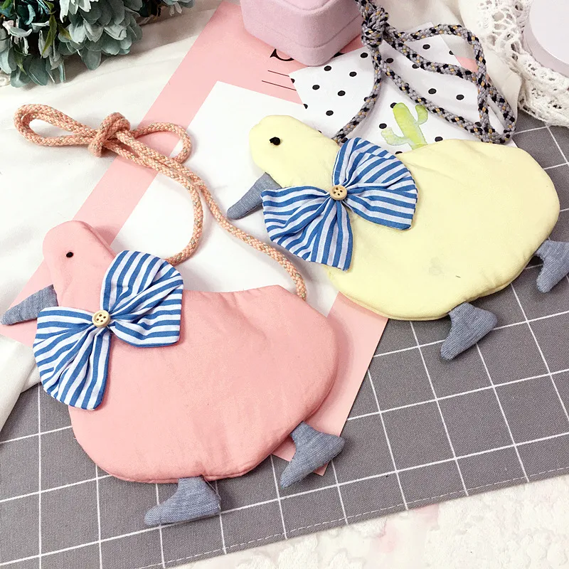 10pcs/lot The single shoulder-bags Children Backpacks Duck shape with bows design Backpacks Concise Tassels Coin Purse Cute Kids Snack bags