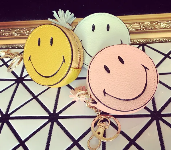 Wholesale- Lovely Cartoon Small Coin Purse Women's Purse Smiling Face Pill Eye Interesting Tassels Bag Pendant Girls Leather Wallet