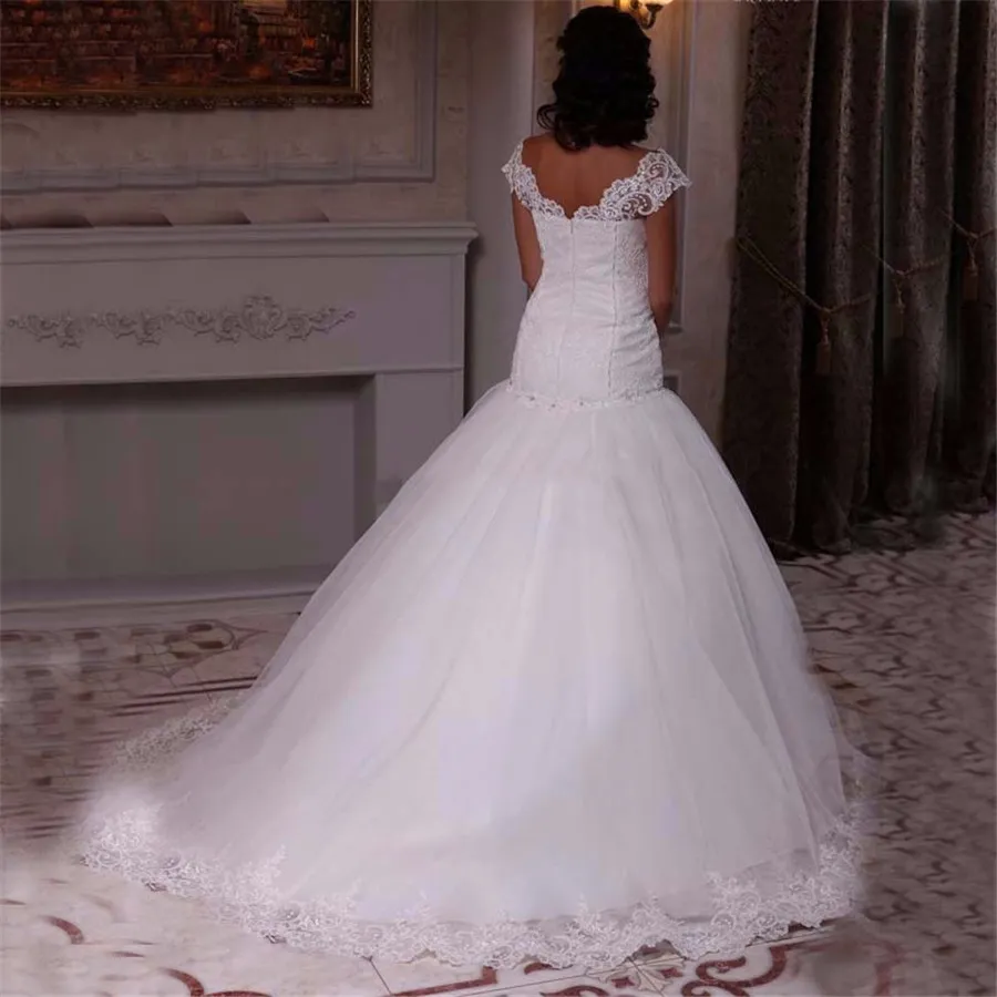 Abiti da sposa a sirena eleganti con scollo a V su misura lunghi 2019 Nuovi abiti da sposa in pizzo e tulle con applique in avorio sexy274S