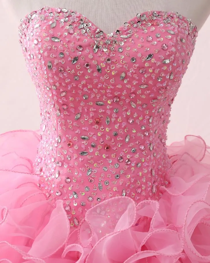 Różowe sukienki Quinceanera 2023 suknie balowe z koralikami kurtka Ruffled organza koronkowa w górę puchowa puchowa sukienka na bal maturę