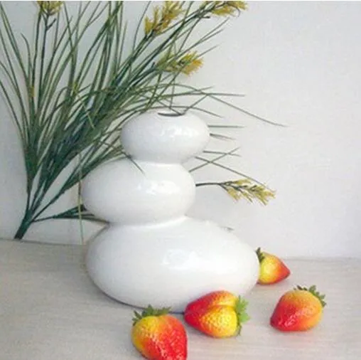 モダンなサンシェングストーンシェイプホームデコレーション用のセラミック花瓶の花瓶黒と白の色7719301