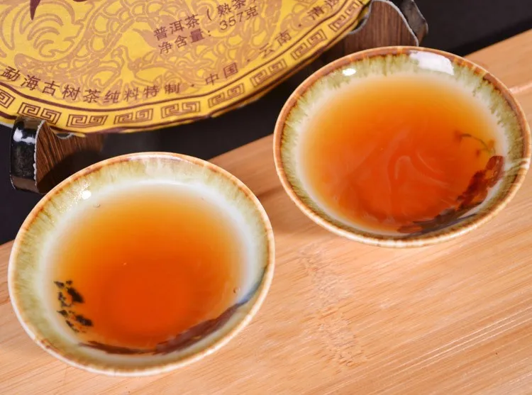 Cooked Pu'er tea, Pu'er tea, 357 grams, the world limited edition of 6666 cakes, ancient, sweet, dark red Pu'er tea, tree free delivery