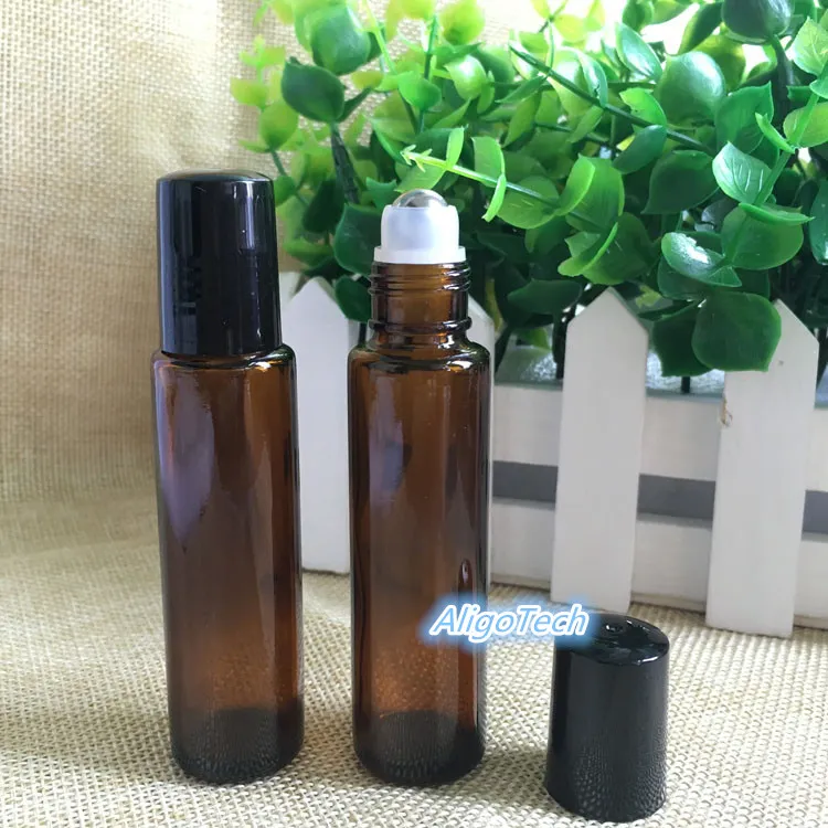 600 sztuk / partia Amber Glass Roll On Bottle 15ml 1 / 2oz Essential Oil Pusty Aromaterapia Perfumy Butelka 15ml z metalową piłką DHL DHL