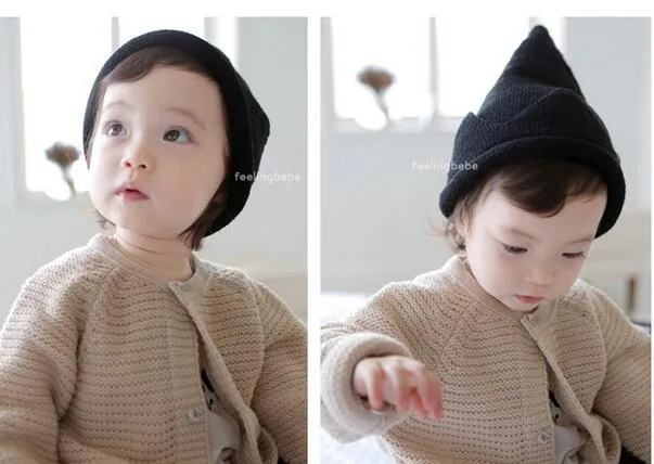 Autumn and winter boy and girls hat Children's spire turtleneck cap warm hat Crown knitting hatfree shipping