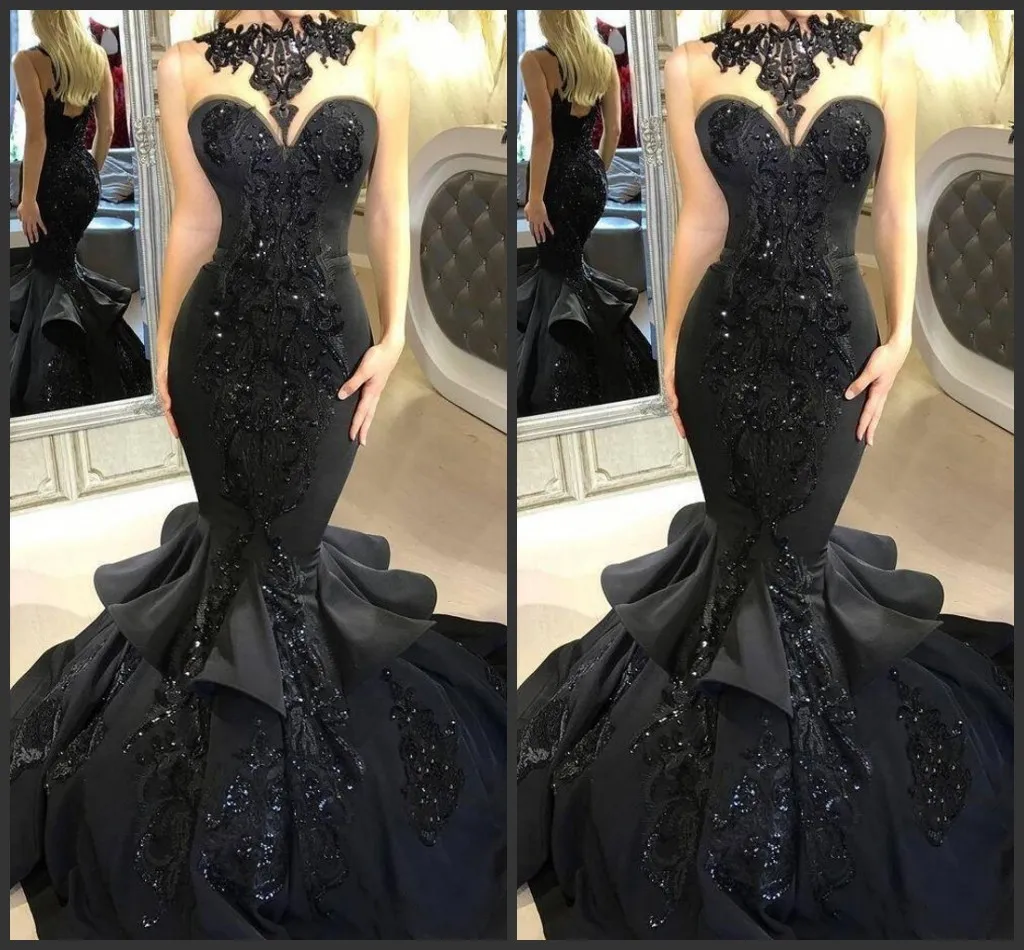 2020 Ny fantastiska svarta långa kvällsklänningar Beaded Appliqued Cascading Ruffled Mermaid Court Train Backless Formal Party Prom Gowns 2018