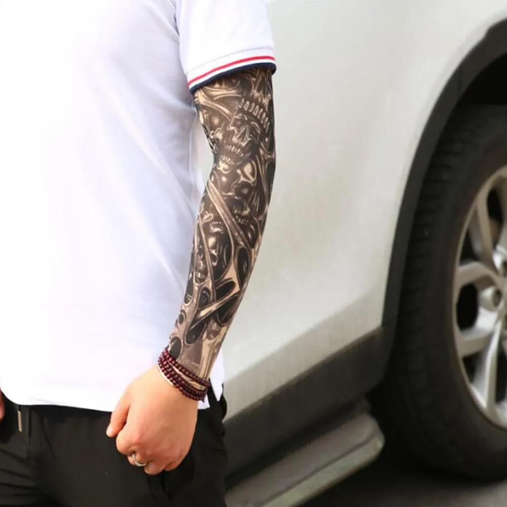 夏のアウトドアスポーツフィットネスユニセックスストレッチナイロンの偽の一時的なタトゥーの袖弾性的な抗紫外線女性男性腕のストッキングスリーブ