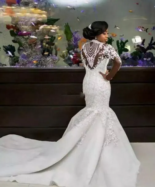 Lyxig 2019 Afrikansk sjöjungfru bröllopsklänningar Långärmad Sexig Sheer High Neck Sparkle Pärlor Lace Satin Nigerian Chapel Bridal Gowns Plus Storlek