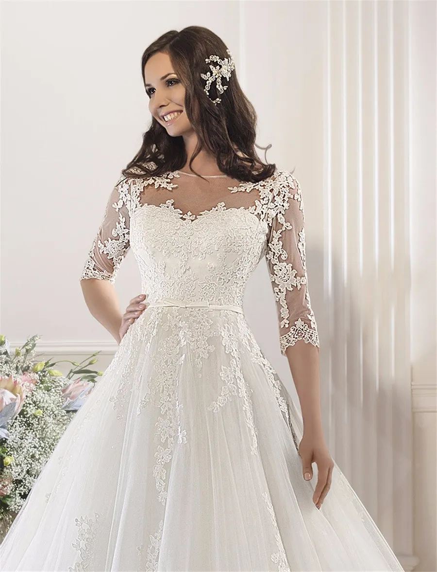 Nuovo arrivo 2019 Mezze maniche Ball Gown Abito da sposa Robe de mariage Applicazioni Abiti da sposa in pizzo Illusion Back286A