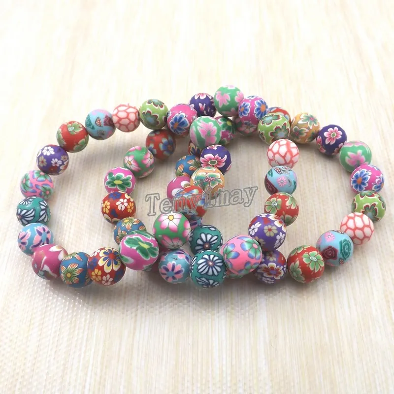 Braccialetti di moda in argilla polimerica interi 20 pezzi Braccialetti di perline bohémien Regalo bambini267P