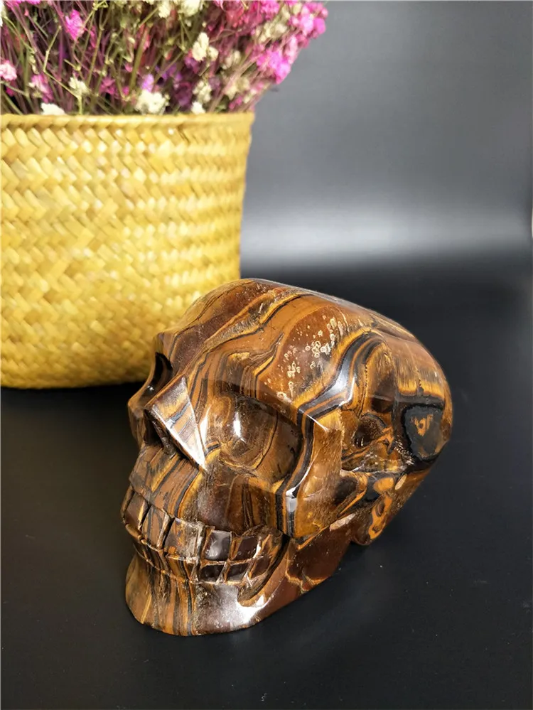 New product natural tiger-eye crystal skull Hand Carved tiger eye quartz skull for home decoration 1.12 kg