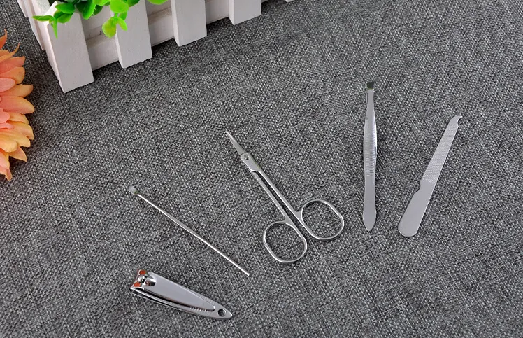 Högkvalitativ 50st Rostfritt stål Nail Care Set Pedicure Scissors Tweezer Knife Ear Pick Utility Nail Clipper Kit Manicure Set