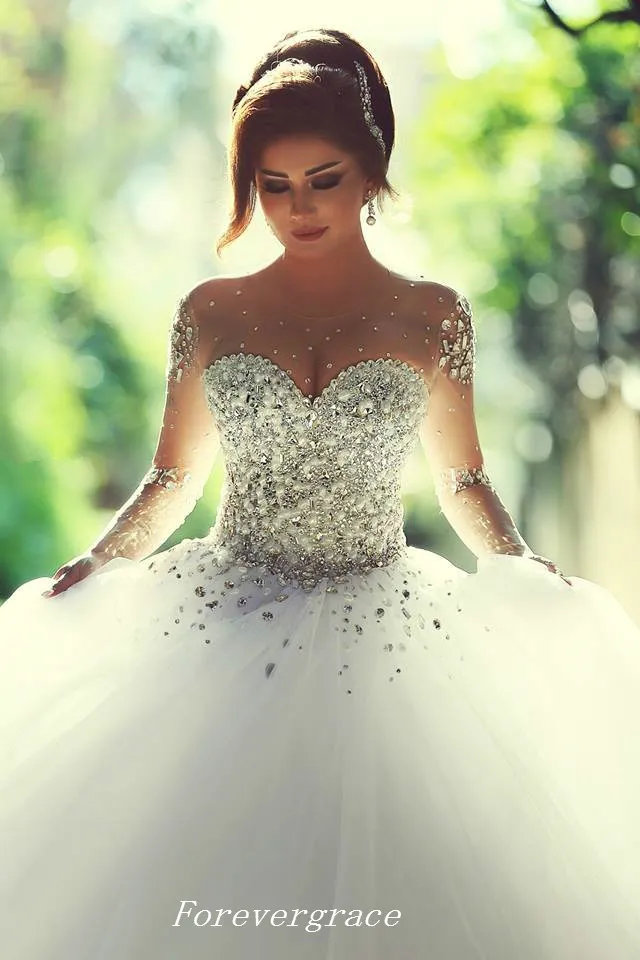 Prinsessan Långärmad Bröllopsklänning Sexig Ball Gown Sweetheart Beaded Crystal Luxury Women Bridal Party Gown Plus Size Vestido de Noiva Longo