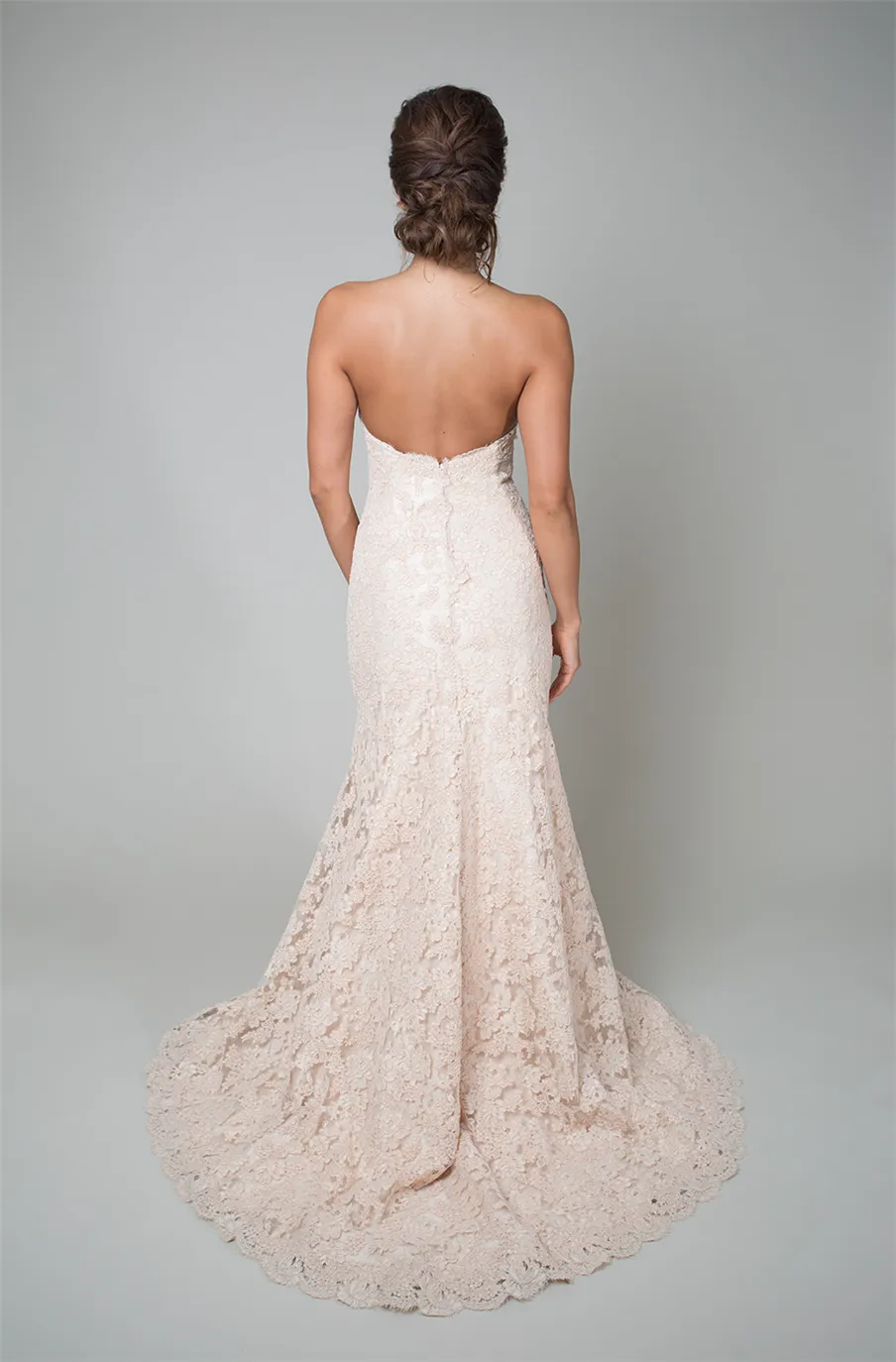 Trumpet Style Wedding Gown Blush Base With Blush Italian Alencon Lace a Sweetheart Neckline Low Back And a Chapel Train Bridal Dress