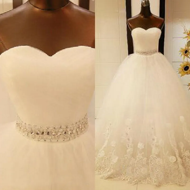 2016 Robes de mariée de pays sur mesure Sexy Sweetheart Neck Sparkly Crystal Sash Ivoire Dentelle Applique Une Ligne Dos Nu Corset Robes De Mariée