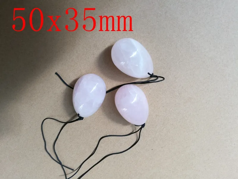 / Livraison rapide 50X35mm Jade forée Natural Rose Quartz oeuf Kegel Yoni exercice oeufs pour les femmes des soins de santé avec la poche