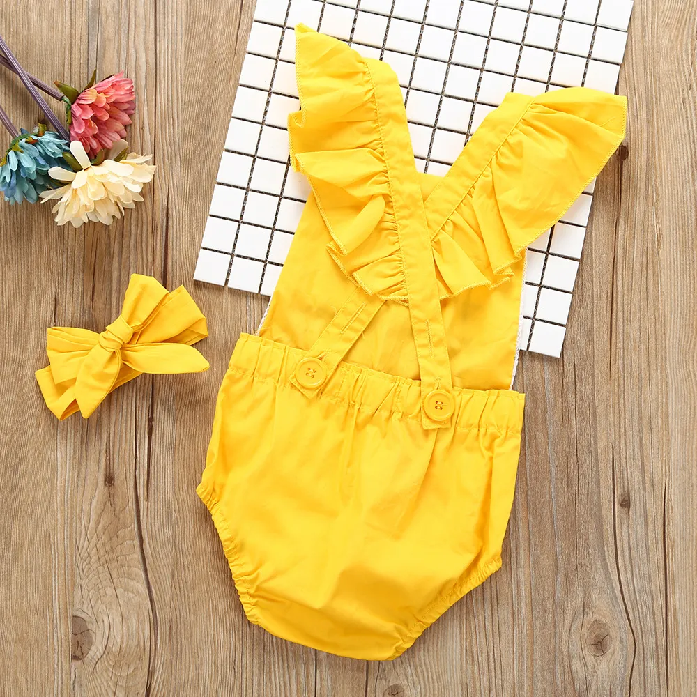 Mameluco amarillo para niña best sale