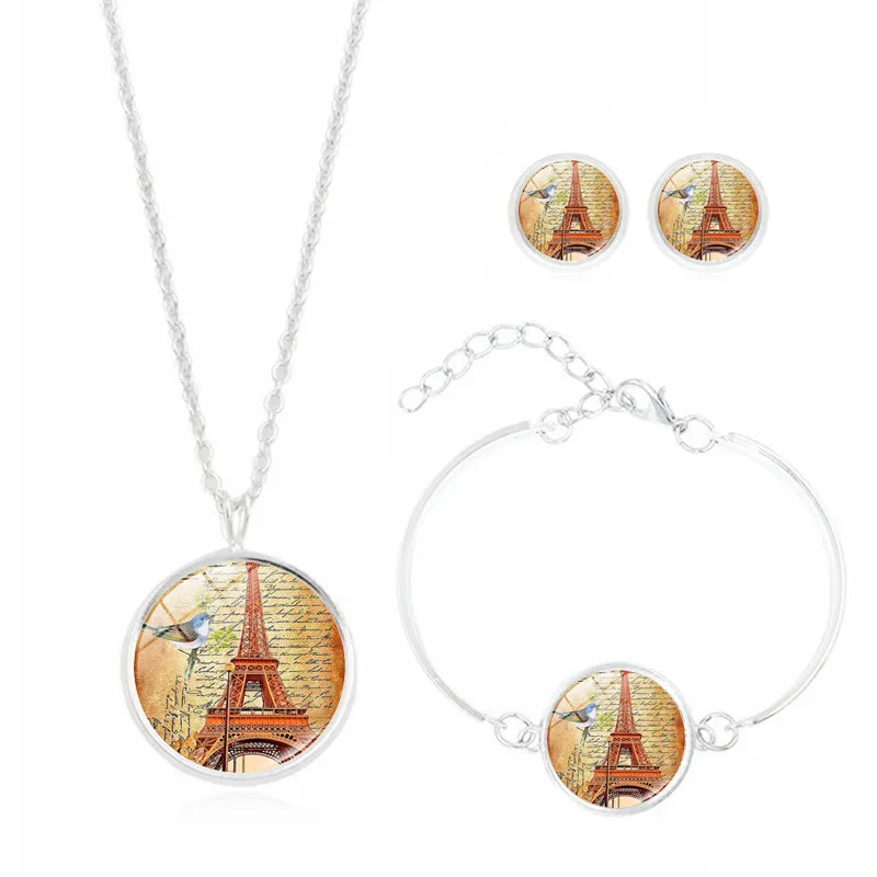 Nuovo set di di gioielli vintage con cabochon in vetro placcato argento a forma di torre Eiffel, collana girocollo, orecchini e bracciale Chi3557384