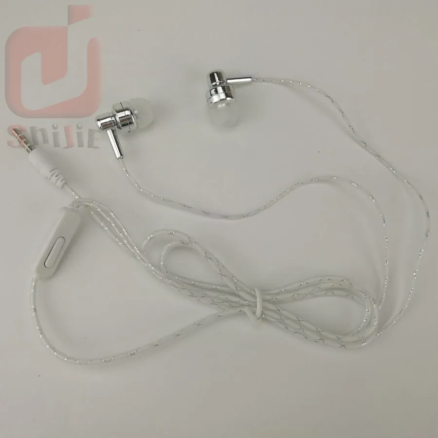 Cheap Earphone Headset Stereo Music Earphones Headsets with microphone for iPhone articles displayed on sidewalk floor 1000ps