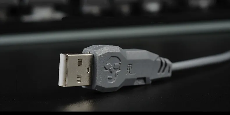 Nowa przewodowa klawiatura do gier USB marki Smukła klawiatura optyczna z kolorowymi podświetleniami Mechaniczny dotyk Poczuj trójkolorowe podświetlenie