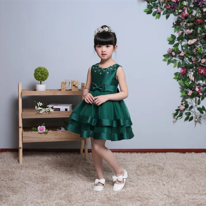 2017 Puffy Green Tulle Flower Girl Abiti da festa di nozze Abito da ballo con fiocco in paillettes Abiti da prima comunione Abiti da battesimo 1 anno di compleanno