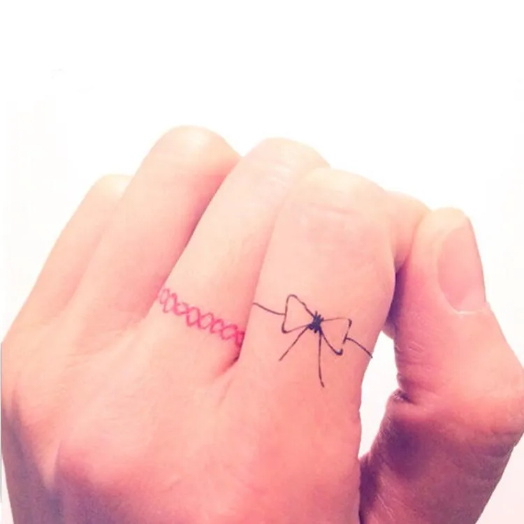 35 Cute Bow Tattoos On Finger  Tattoo Designs  TattoosBagcom