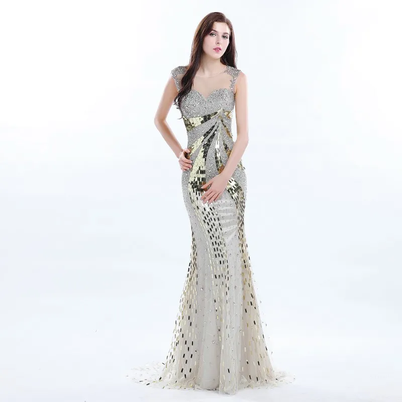 Stunning Golden Sequined Prom Dresses Sheer Neckline Sleeveless Shinny Crystal Backless Mermaid Evening Gowns Gorgeous Celebrity Party Dress