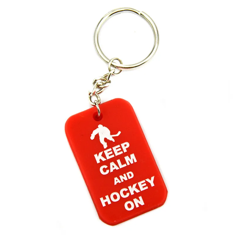 50 pièces garder le calme et le Hockey sur l'étiquette de chien en Silicone porte-clés Logo en creux rempli de cadeau de Promotion de couleur