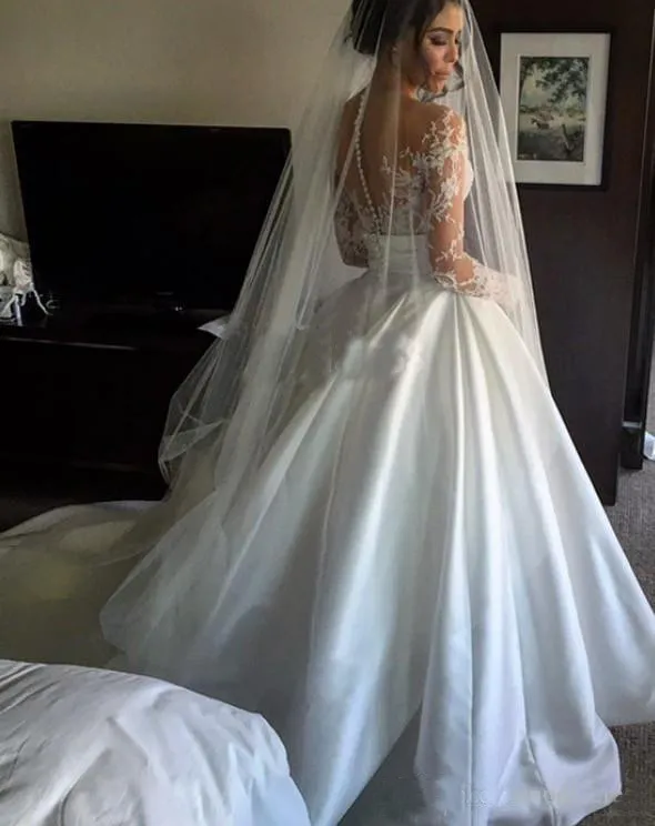 2017 nouvelles robes de mariée en dentelle fendue avec jupe détachable pure cou manches longues gaine haute fente overskirts robes de mariée