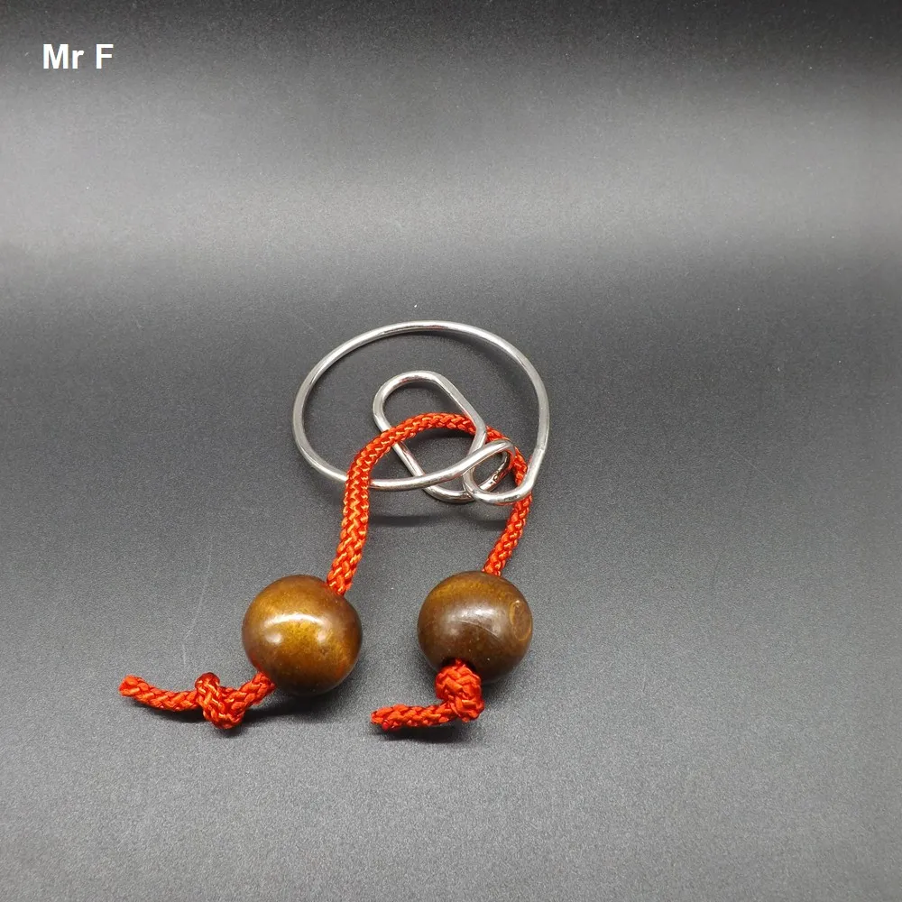 Rope Snail Ring Wire Puzzle Novelty Game Adult Child Kid Intelligence