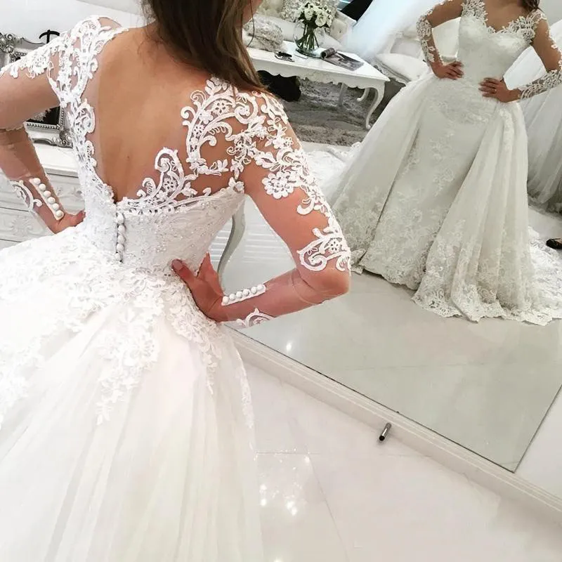 Modest 2017 Lace Aplikacja Overskirt Suknie ślubne z odpinanym pociągiem z długim rękawem Tulle Suknie ślubne Custom Made China EN12169