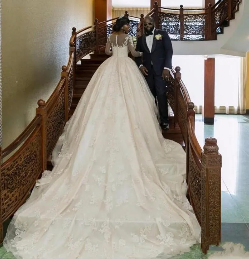 Cheap Arabic A Line Wedding Dresses Jewel Neck Illusion Long Sleeves Full Lace Beads Wedding Gown Chapel Train Plus Size Formal Bridal Dress