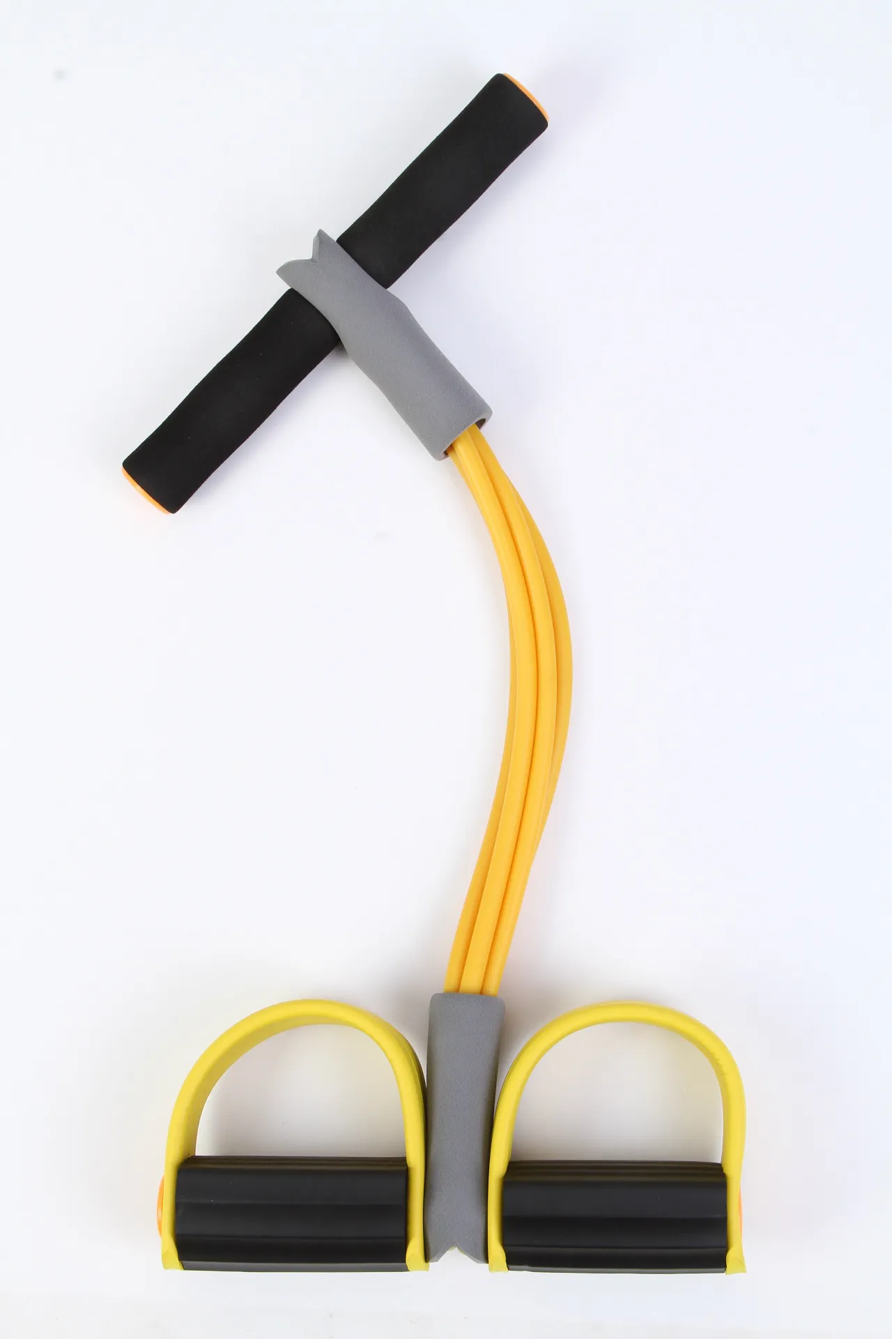 L'espansore del tubo toracico a quattro pedali fornisce attrezzature per il fitness domestico AB scricchiola l'attrezzatura Bande di resistenza