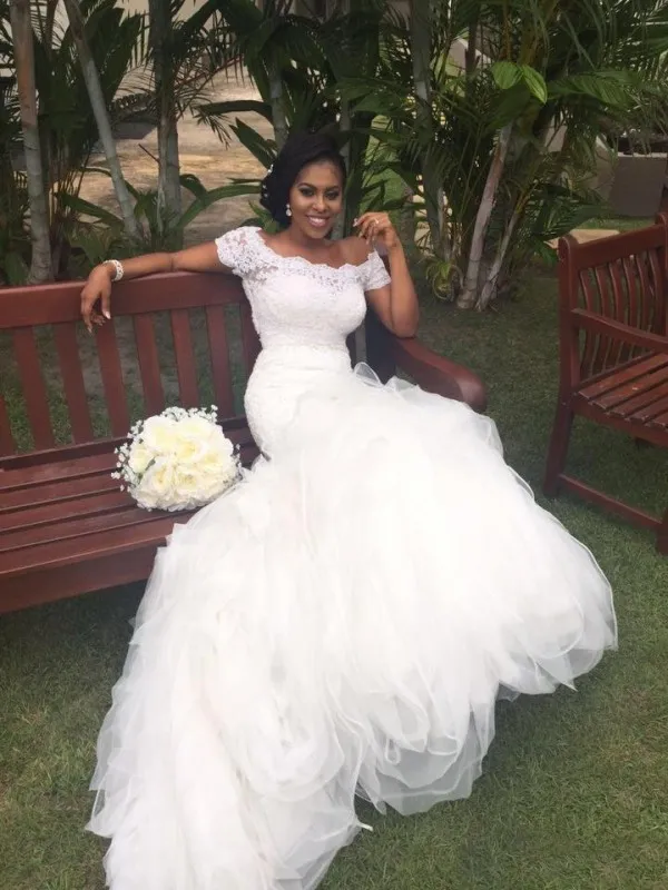 Fit and Flare African Mermaid Wedding Dresses Off the Shoulder Portrait Short Sleeves Lace Top Ruffled Skirt Stunning Bridal Gowns