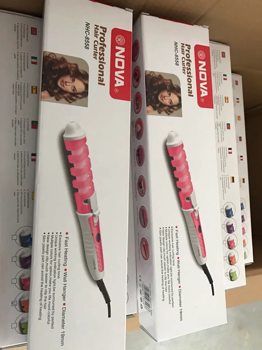 2016 Electric Magic Hair curler Styling Tool fast heating hair stick Rizador Pelo Roller Pro Spiral Curling Iron wall hanger NHC-8558