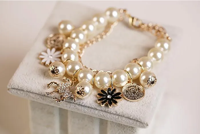 Remise Bracelet de perles petit cheval à bascule pétale fleur Figure tête mélange mode multiétages coréen joli bracelet pour fille femmes fête