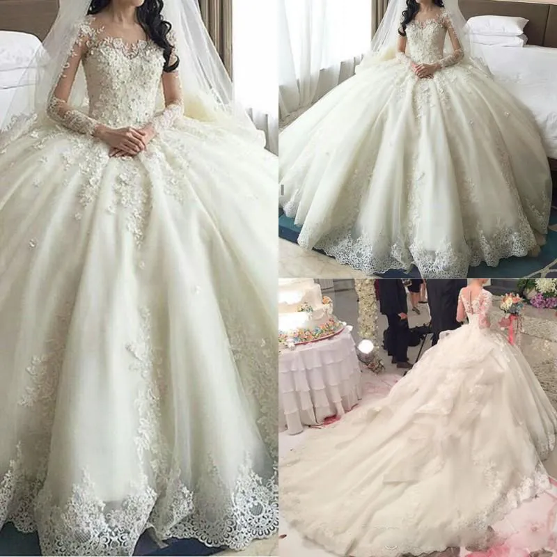 قطار المحكمة vestidos الرباط فستان الزفاف طويل الأكمام مع الوهم شير الرقبة عودة المغطاة أزرار أثواب الزفاف