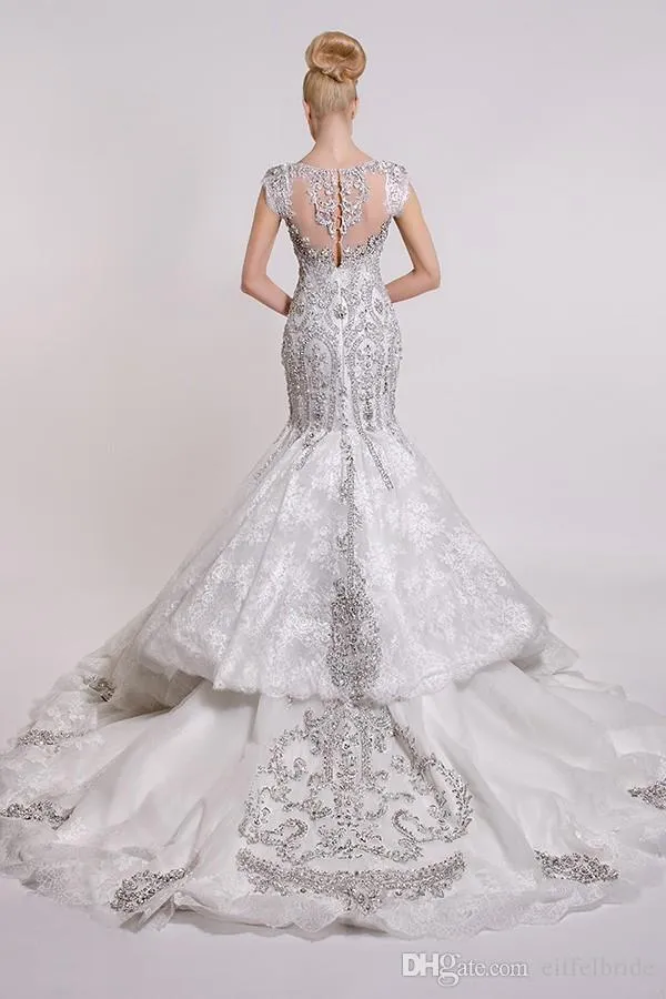 Abiti da sposa scintillanti di lusso costosi 2017 Sexy Bling in rilievo di cristallo Applique in pizzo con scollo a V sirena tromba abiti da sposa cappella treno