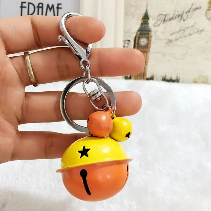 Gratis Tecknad Söt Metall Candy Color Bells Key Ring Pendant Creative Couple Car Bag Pendant Tillbehör R049 Konst och hantverk 