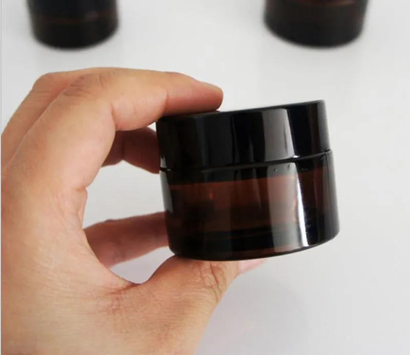 5G 10G 20G 30G 30G Brown Amber Glass Cream Jar con coperchio nero Crema cosmetica Imballaggio il campione Eye Cream Bottle F201749