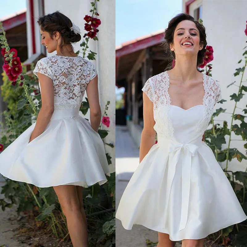 2017 Ny kort strandbröllopsklänningar Billiga älsklingsfickor med spets kortärmad brudklänning Casual Custom Made EN6305