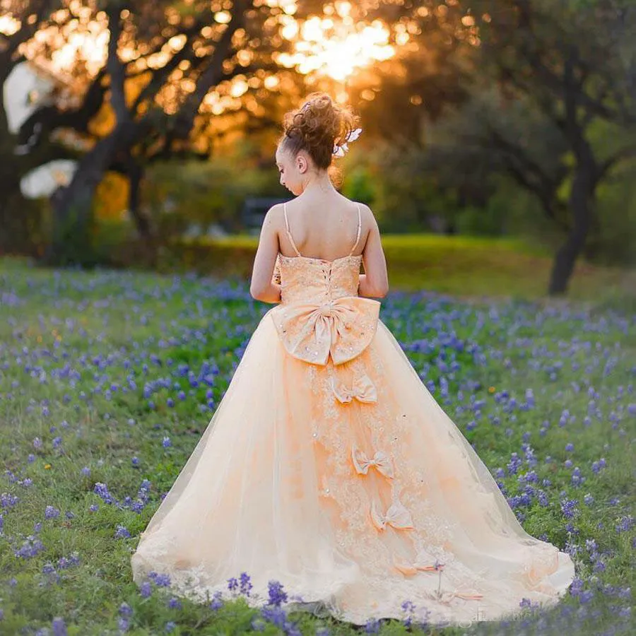 Girls Pageant Dresses 2017 Light Orange Tulle Spaghetti Lace Appliques Beads Bow Flower Girls Dresses For Weddings Custom Made EF6146