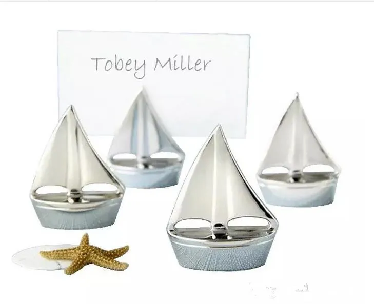 Silver segelbåt placera korthållare med matchande kort för strandbröllop och festdekorationer