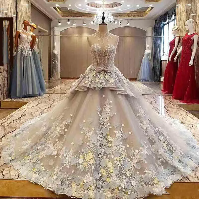 Luxury Floral Appliques Bröllopsklänningar 2018 Sheer High Neck Ärmlös Bow Peplum Bridal Gowns Vintage Backless Sweep Train Vestidos